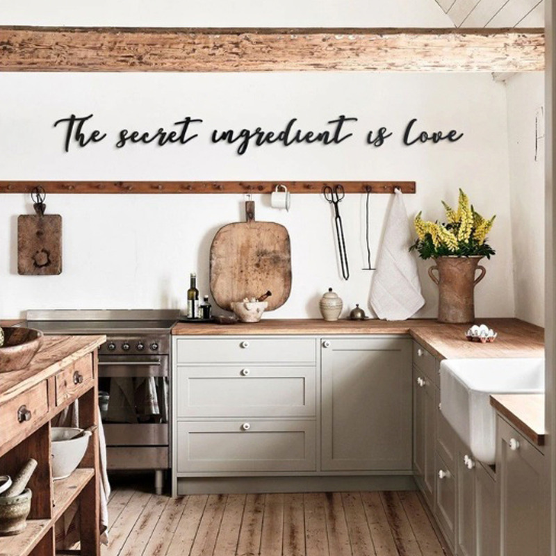 Frase decorativa THE SECRET INGREDIENT IS LOVE