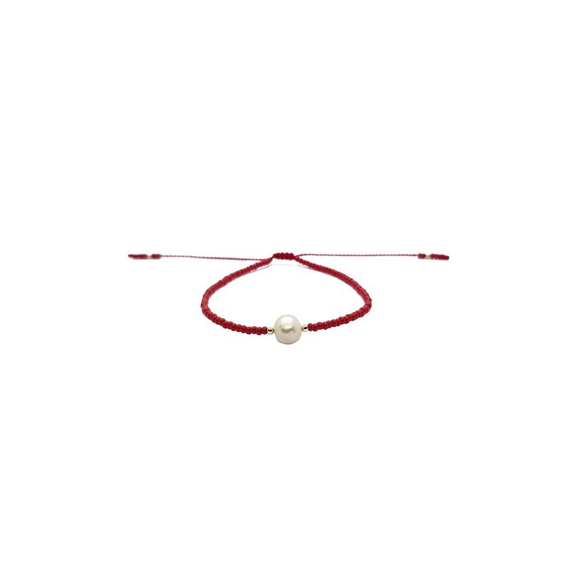 Pulsera con perla natural al centro.